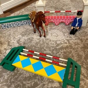 Wooden toy horse jumps